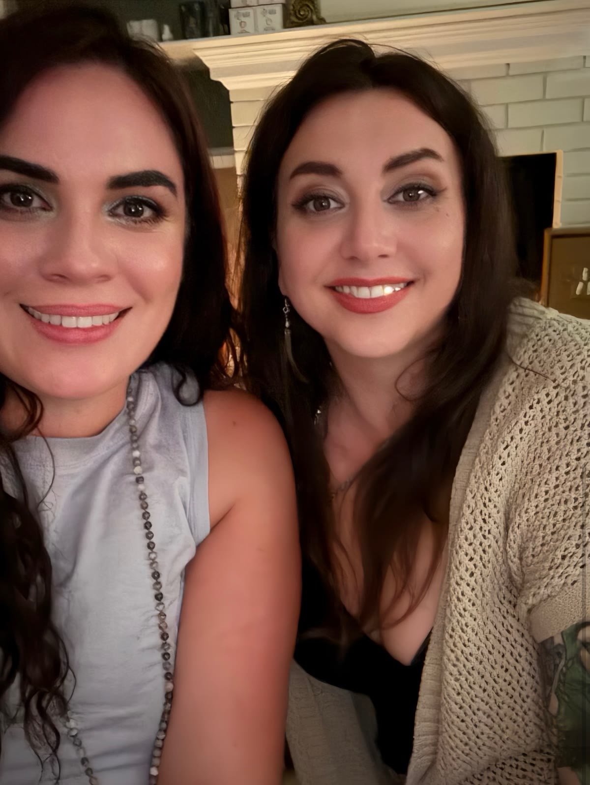 Melissa and Nicola Buffa together by the studio fireplace